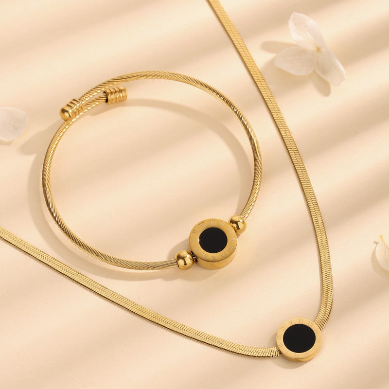 Set de collar y pulsera con números romanos