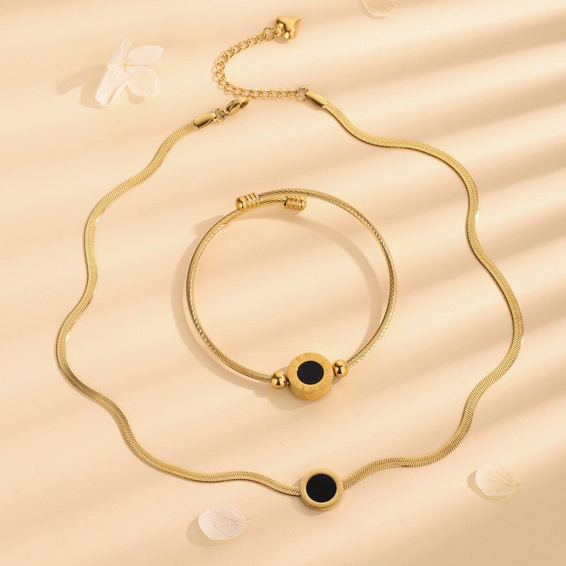 Set de collar y pulsera con números romanos