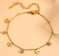 Tobillera con ojos y circonias chapado en oro